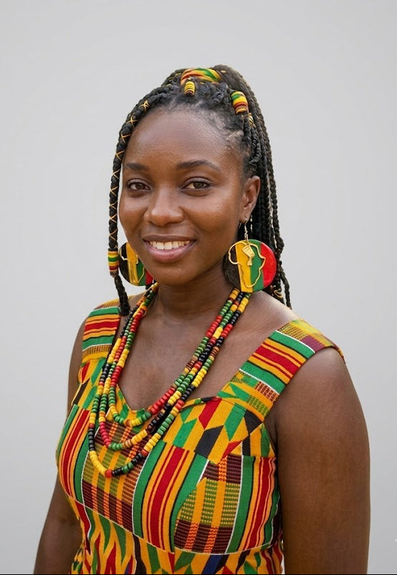 A woman wearing Joe Wess earrings, showcasing elegant craftsmanship and refined, timeless design.